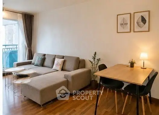 Modern living room with stylish decor and cozy seating area, perfect for relaxation and entertaining.