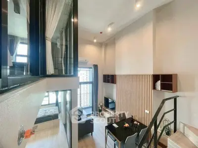 Modern loft apartment with high ceilings and stylish decor