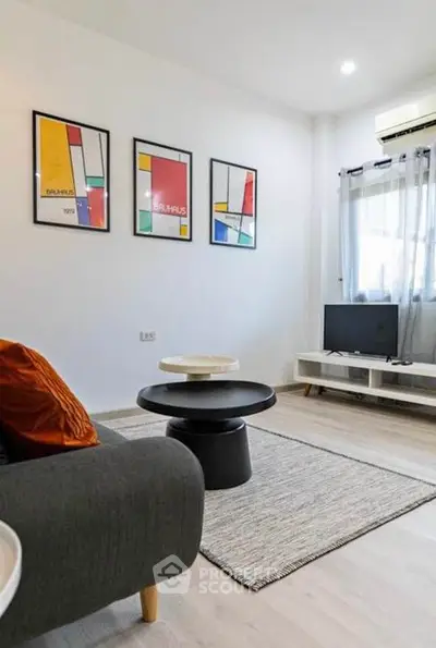 Modern living room with stylish decor and natural light