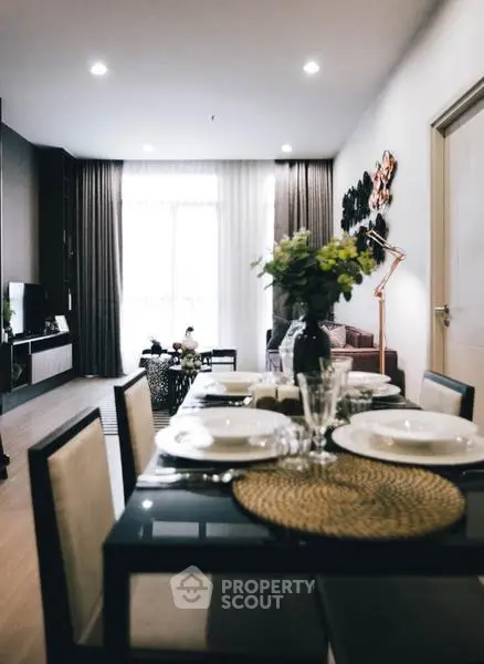 Stylish dining area in modern apartment with elegant decor and natural light