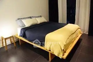 Modern bedroom with stylish bed and cozy lighting, perfect for restful nights.