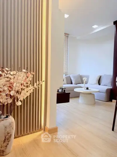 Modern living room with cozy seating and stylish decor