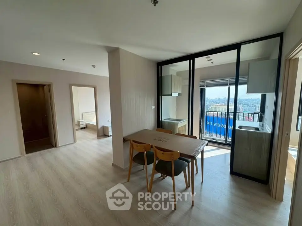 Spacious modern apartment with open layout and city view balcony