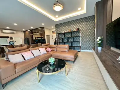 Luxurious modern living room with elegant decor and spacious seating area