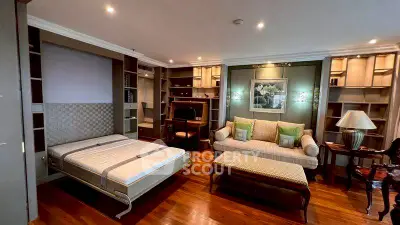 Luxurious living room with elegant furniture and built-in shelving