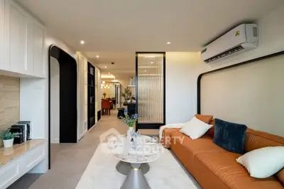 Modern living room with stylish decor and cozy seating area