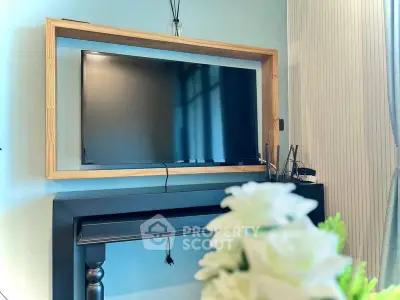 Modern living room with stylish TV setup and elegant decor