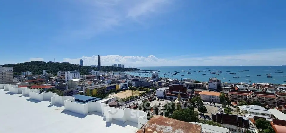 Stunning coastal cityscape with panoramic ocean views and vibrant urban landscape.