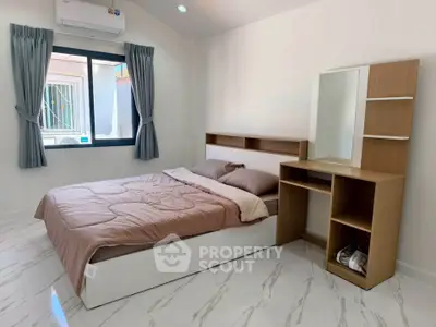 Cozy bedroom with modern furniture and natural light