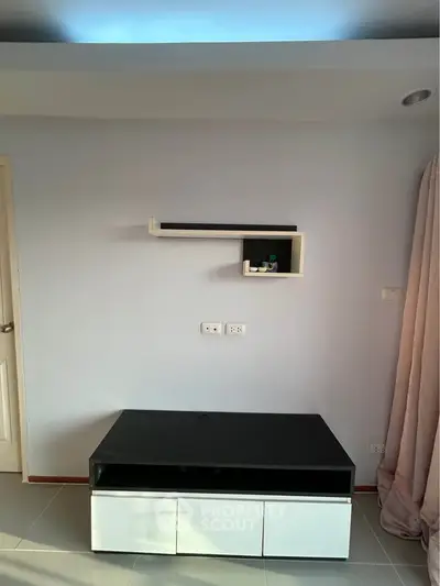 Minimalist interior with modern shelf and cabinet in bright room