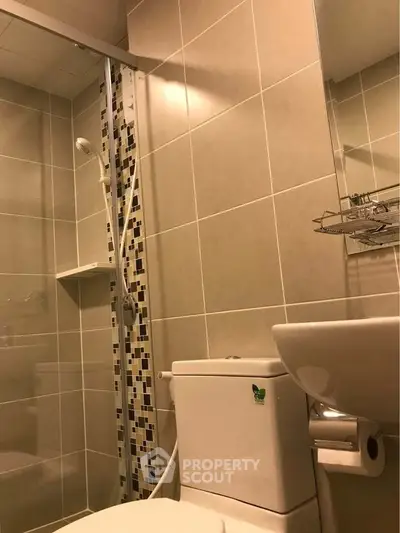 Modern bathroom with sleek tiles and contemporary fixtures