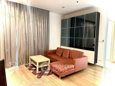 Modern living room with leather sofa and stylish decor