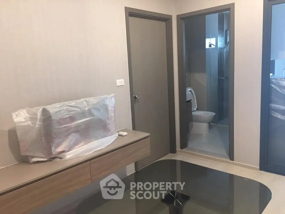 Modern apartment interior with bathroom and sleek furniture