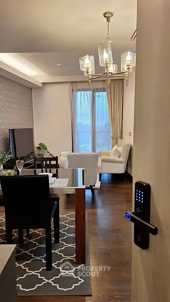 Elegant living room with modern decor and digital lock entry