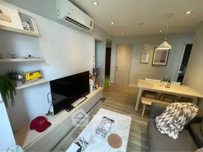 Modern living room with stylish decor and cozy dining area