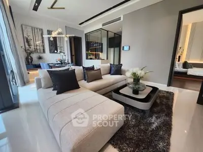 Luxurious modern living room with elegant decor and plush seating in a stylish apartment.