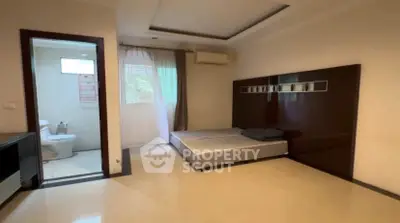 Spacious bedroom with modern design and ensuite bathroom