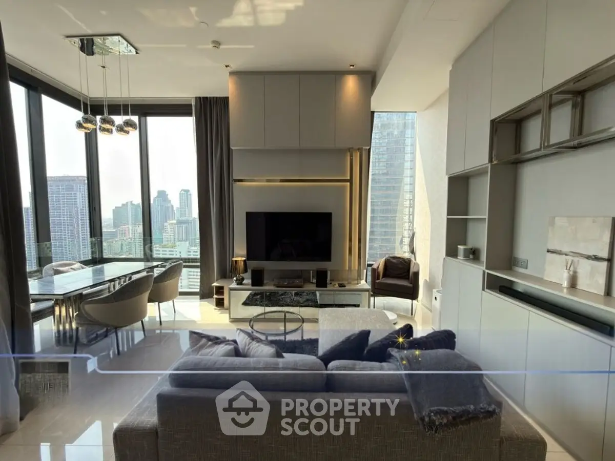Luxurious modern living room with panoramic city views and elegant furnishings.