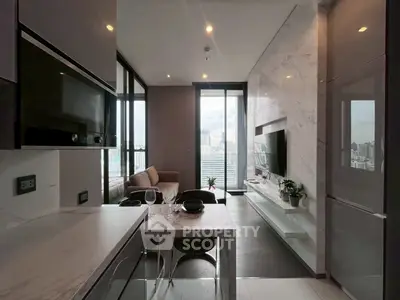 Modern open-plan kitchen and living area with city view