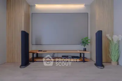 Modern living room with sleek entertainment setup and stylish decor