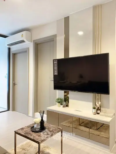 Modern living room with sleek TV setup and stylish decor