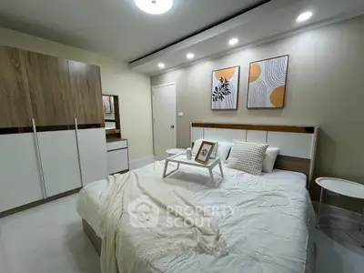 Modern bedroom with stylish decor and cozy ambiance