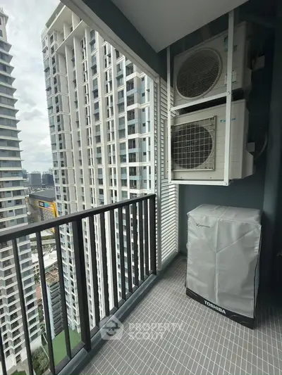 Modern high-rise balcony with city view and air conditioning units, perfect for urban living.