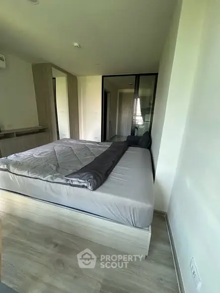 Modern bedroom with sleek design and ample natural light