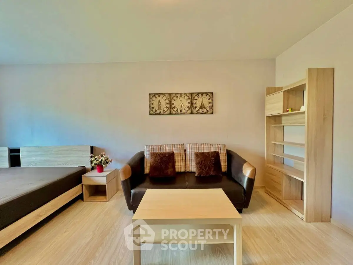 Modern living room with stylish furniture and wooden accents