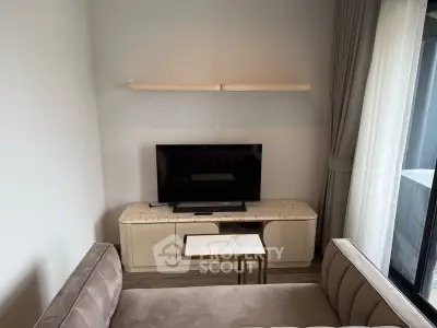 Modern living room with sleek TV setup and elegant furniture