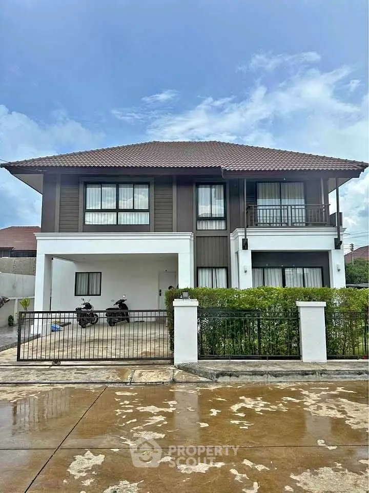 Elegant two-story house with modern design and spacious driveway