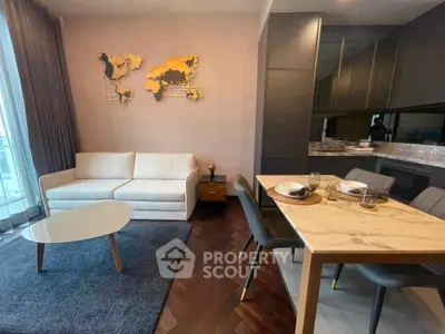 Modern living room with stylish decor and dining area in luxury apartment