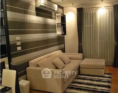 Modern living room with stylish decor and cozy seating area