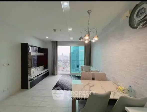 Modern living room with city view, stylish decor, and elegant dining area.