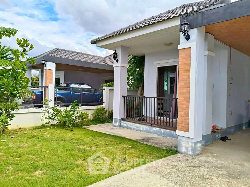 Charming suburban home with lush garden and covered parking area.