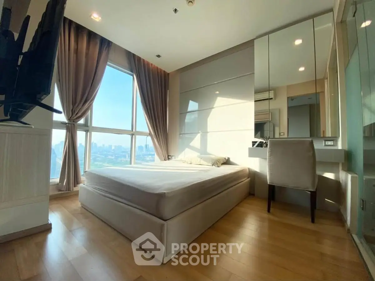 Luxurious bedroom with stunning city view and elegant decor