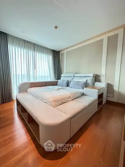 Luxurious bedroom with elegant design and large windows for natural light