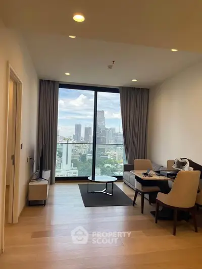 Modern living room with stunning city view and elegant furnishings