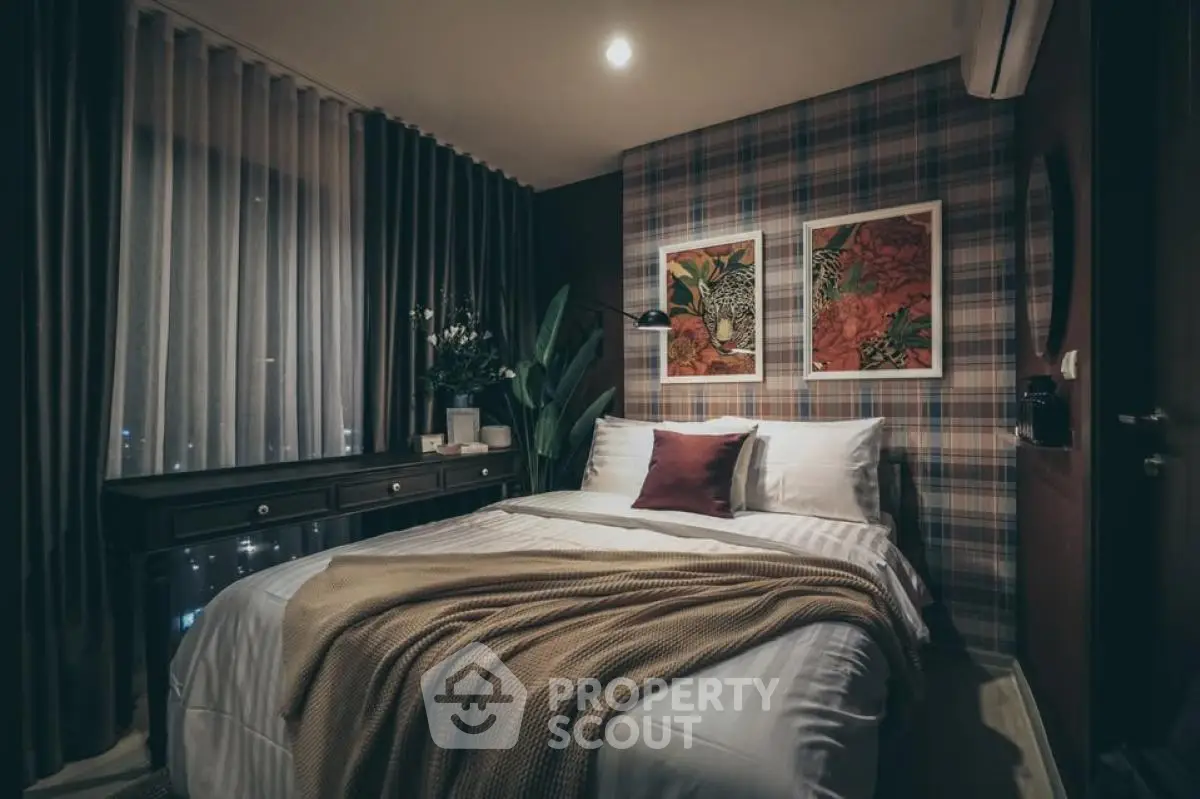 Cozy bedroom with plaid accent wall and elegant decor
