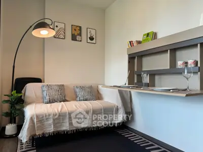 Cozy living room with modern decor and stylish furniture, perfect for relaxation and entertaining.