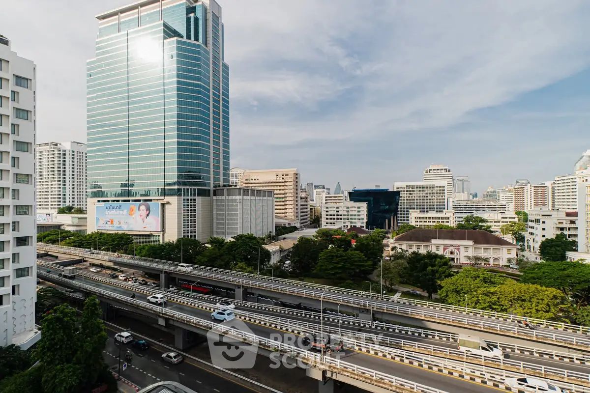 Stunning cityscape view showcasing modern high-rise buildings and elevated highways.