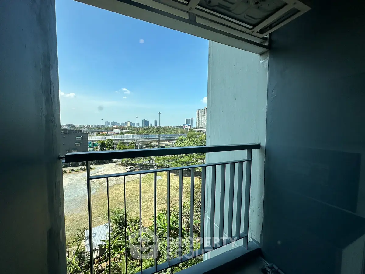 Stunning cityscape view from a modern balcony, perfect for urban living.