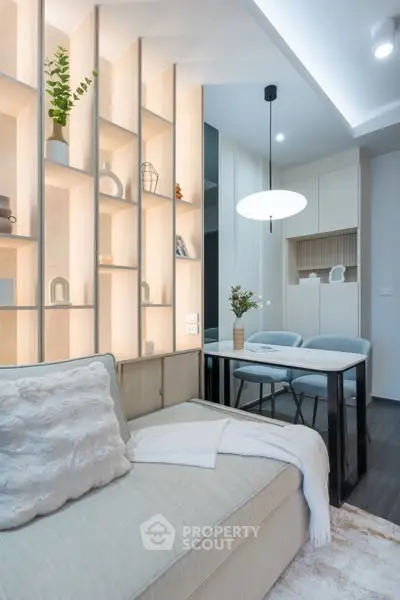 Modern living room with stylish shelving and cozy seating area