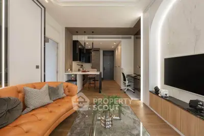 Modern living room with stylish orange sofa and open kitchen layout