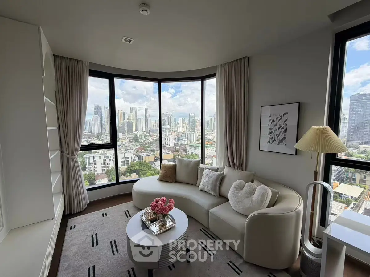 Luxurious living room with panoramic city views and elegant decor