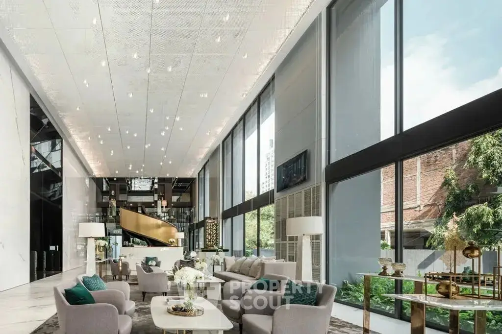 Luxurious modern living room with high ceilings and large windows