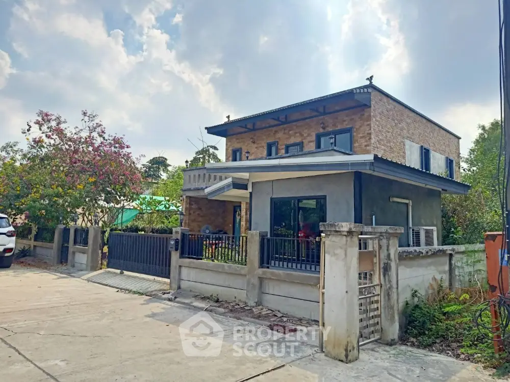 Charming two-story house with modern design and spacious outdoor area