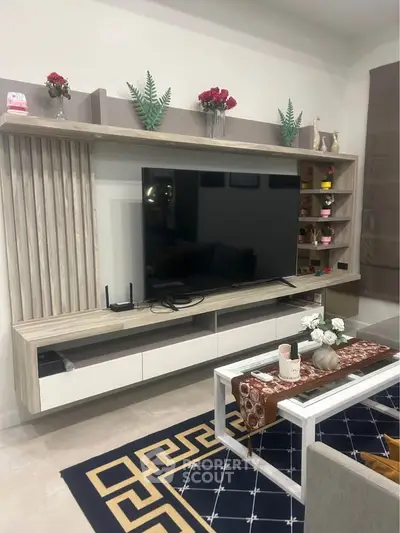 Modern living room with stylish TV unit and elegant decor