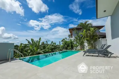 Luxurious villa with private pool and tropical garden view