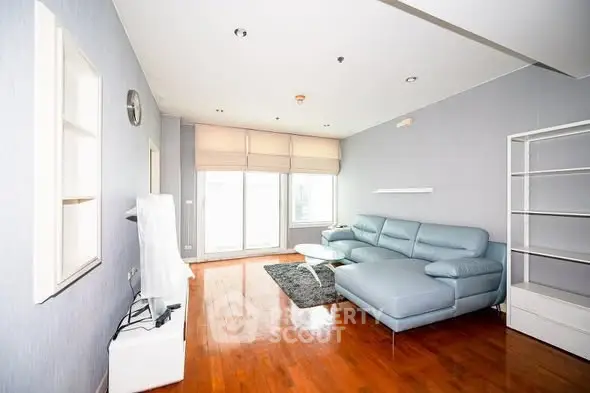 Spacious living room with modern furniture and natural light